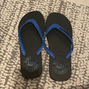 Quiksilver Black Flip Flops with Blue Straps and Logo new but no tags